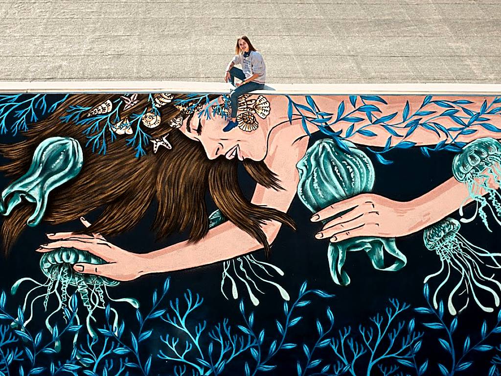 Musya - Girl swimming in plastic mural street-art